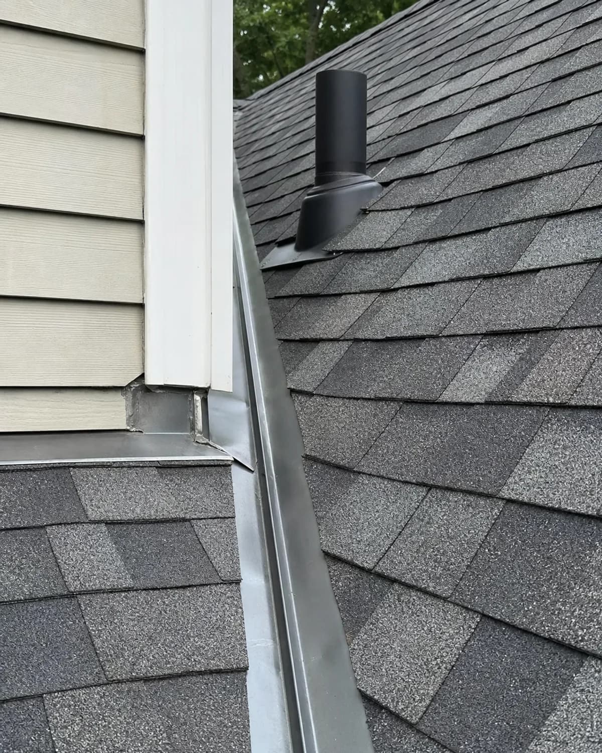 Roof flashing, vent, and shingle detail for residential roofing repair planning