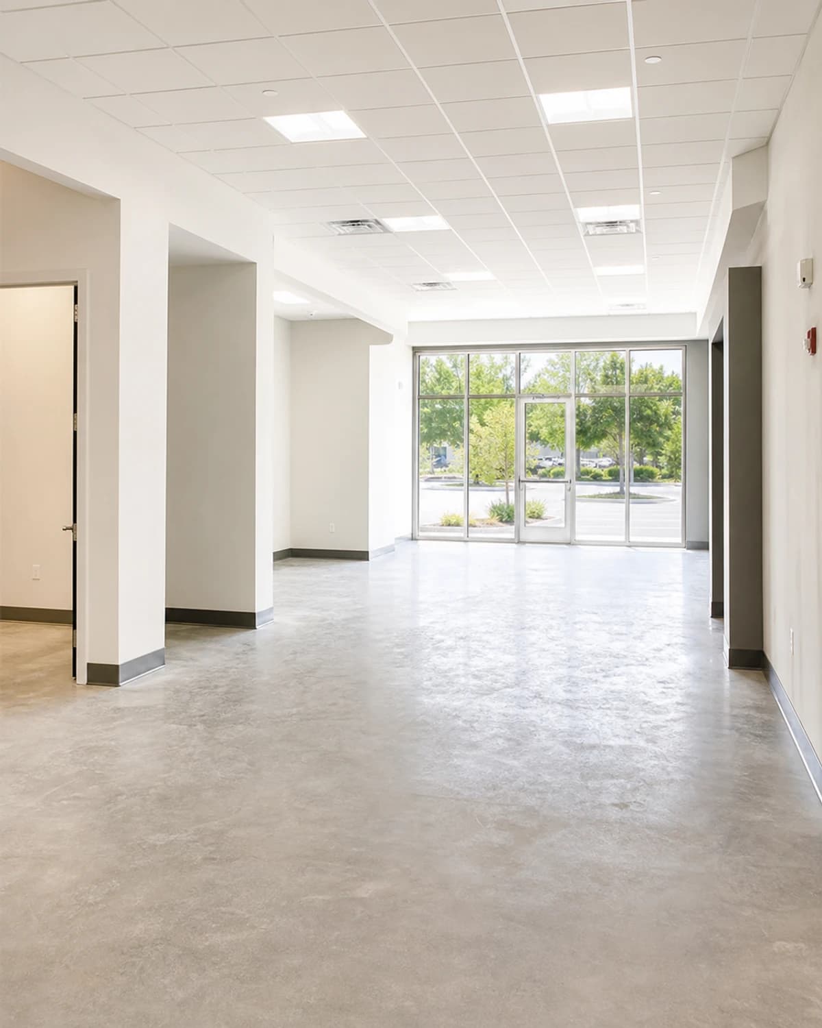 Lease-ready commercial interior with clean paint, lighting, flooring, and practical layout for occupancy